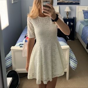 Pretty white eyelet lace dress with keyhole back.